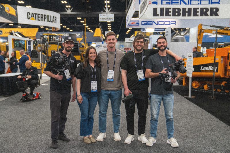 The CDS crew together on the show floor at World of Asphalt