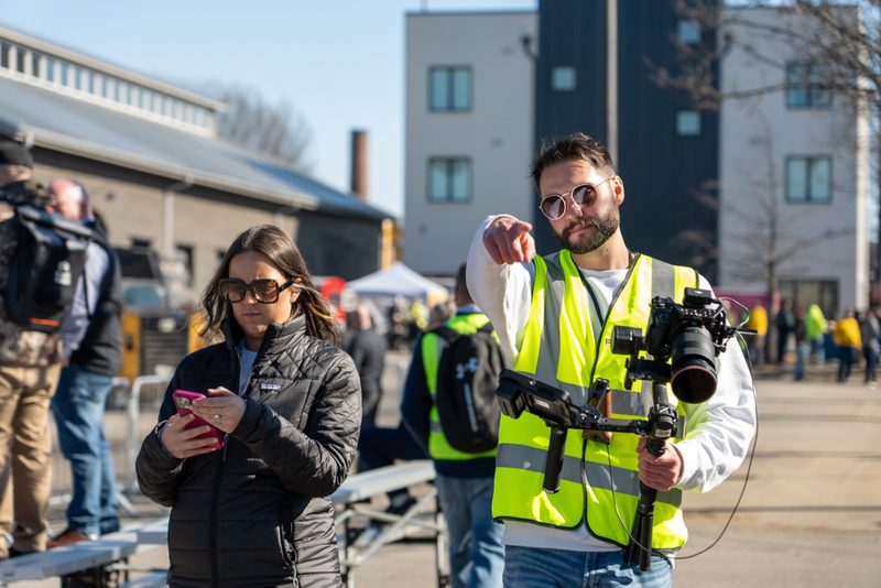 Two of our crew working the demo area, gimbal rig up and ready