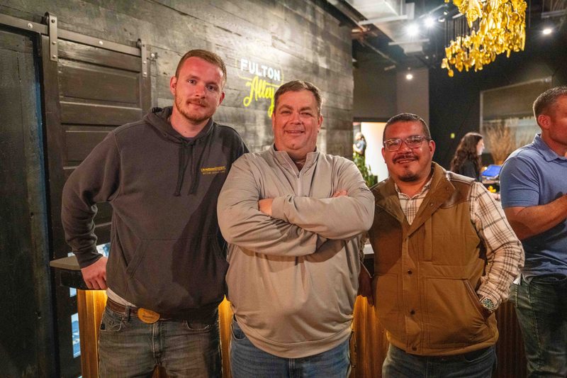 Three of the team together at the evening venue