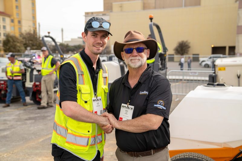 A handshake on the show floor between our crew and the LeeBoy team
