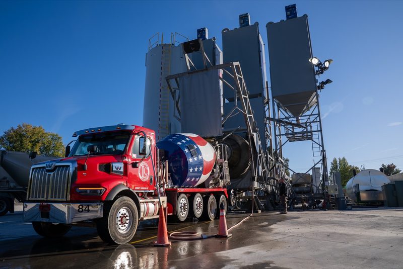 A Loflin mixer loading under the batch plant silos