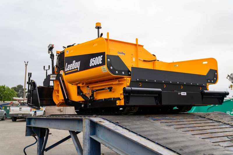 A LeeBoy 8500E paver loaded on the trailer