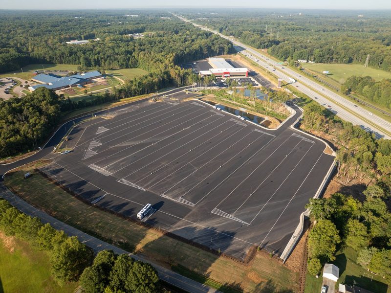 Aerial of the finished lot laid out beside the highway