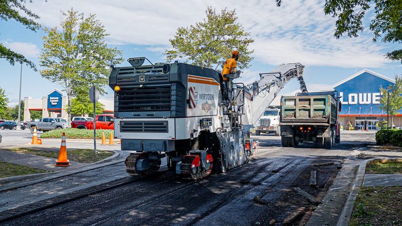 A Wirtgen mill cutting the retail lot and loading straight into the truck