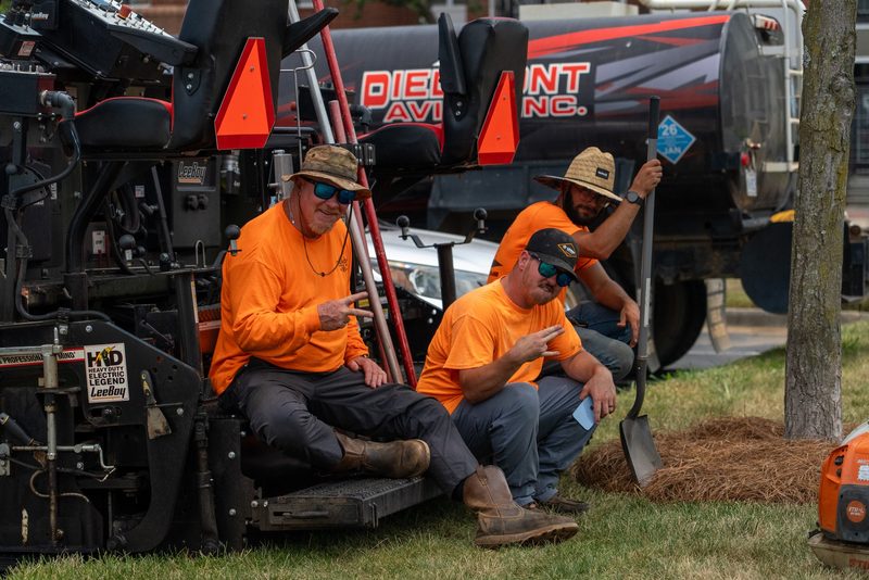 Two of the crew taking a minute on the paver steps