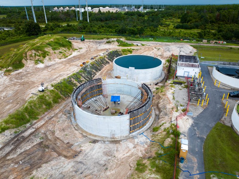 Aerial of the circular tanks going up at the treatment plant