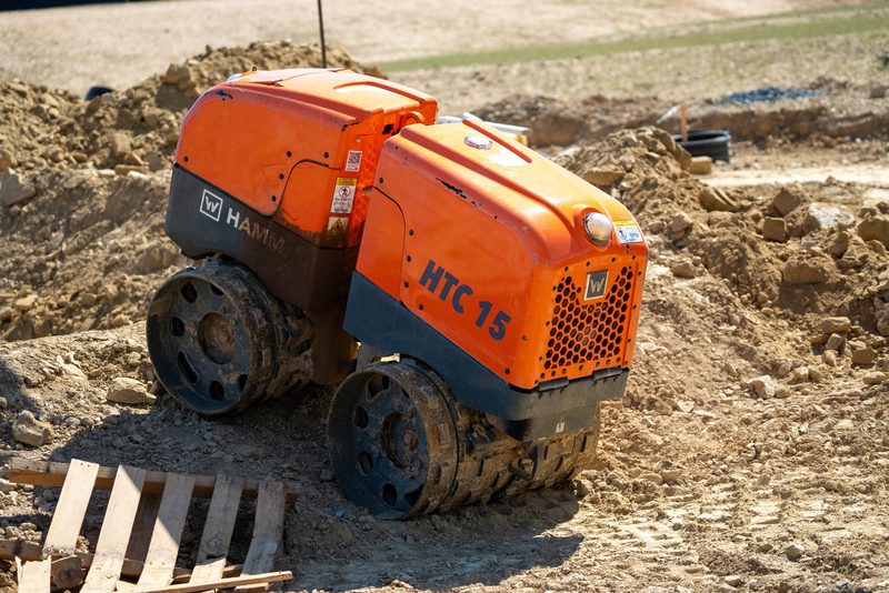 A HAMM HTC 15 trench compactor, isolated three-quarter detail