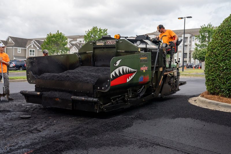 A LeeBoy 8520C WarHawk paver, hopper loaded, in three-quarter view