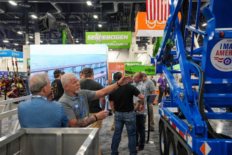 Visitors gathered around the Anderson UnderBridge unit at ConExpo
